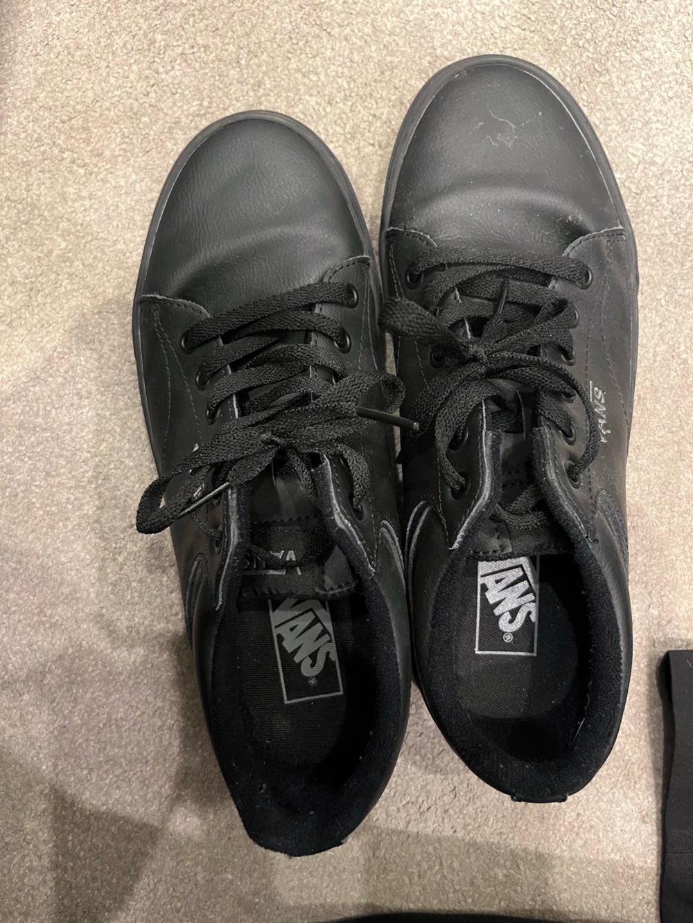 Vans Black Leather Low-Top Sneakers